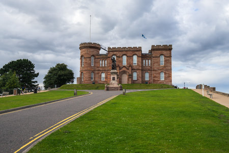 A long shot of the famous Inverness Castle in Scotland under a cloudy skyのeditorial素材