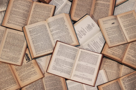 An overhead closeup shot of open books of literature - perfect for backgroundのeditorial素材