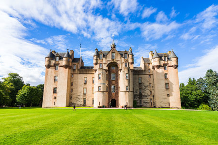 A beautiful scenery of the famous Fyvie Castle in Aberdeenshire, Scotland under a cloudy skyのeditorial素材