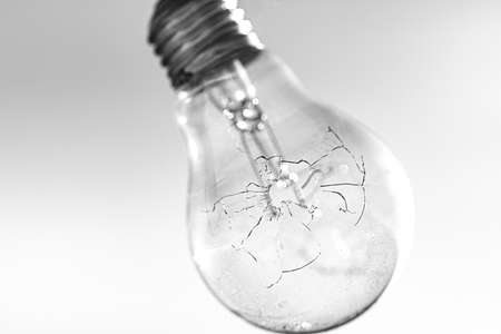 A closeup shot of a transparent glass lightbulbの写真素材