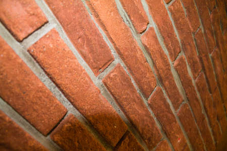A closeup shot of the red brick wall texture or backgroundの写真素材