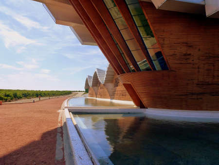 A pathway near buildings over the water in Spain