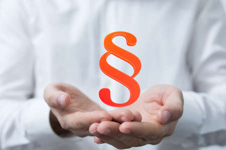 paragraph law sign digital in hand 3dの写真素材