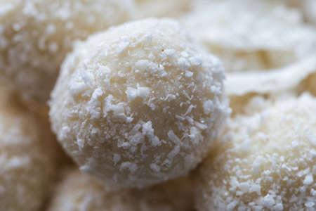 A closeup shot of raw raffaello coated with coconut flakesの写真素材