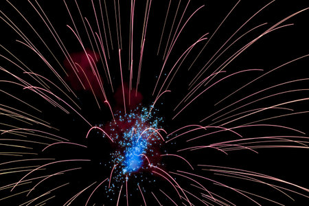 A colourful firework during the night - great for backgrounds and wallpapers
