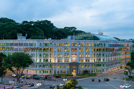 SINGAPORE, SINGAPORE - Feb 15, 2020: Main view of the Old Hill Street Police Station. The colorful building of the Ministry of Communications and Information and the Ministry of Cultureのeditorial素材