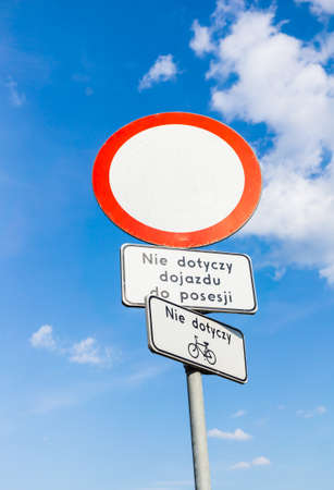 The traffic sign with the blue sky in the backgroundの写真素材