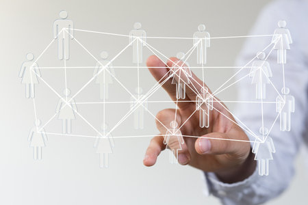 A closeup shot of a person presenting the virtual projection of social networkの写真素材