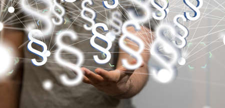A male hand and section signs with blurred background