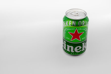 AACHEN, GERMANY - Mar 13, 2020: a downview shot of a cool refreshing can of heineken beer on a white background with space for textのeditorial素材
