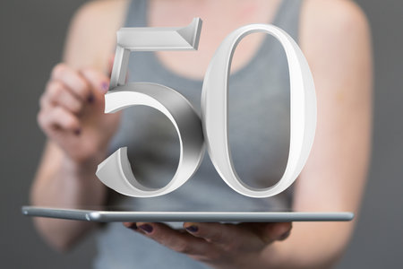 50 years anniversary celebration logotype with elegant celebrationの写真素材