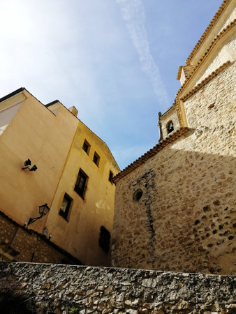The beautiful view of the old buildings under the blue sky in Cuenca, Spainのeditorial素材
