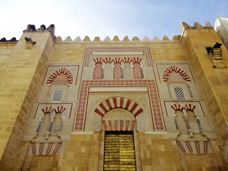 A low angle shot of a beautiful Mosque-Cathedral of CÃ³rdoba in Spainのeditorial素材