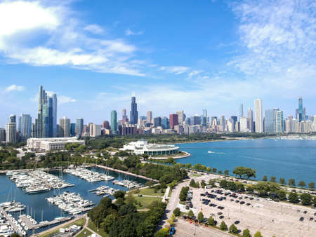 CHICAGO, UNITED STATES - Sep 18, 2019: aerial drone footage of the city of Chicago downtown skyscraper landscape during high-noon. the sky's are clear blue as the building have a colorfulのeditorial素材