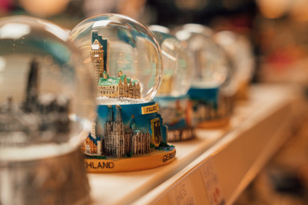 A closeup of snow globes in the Christmas market in Frankfurt, Germanyの写真素材