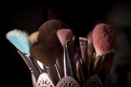 A closeup shot of the painting brushes with black background