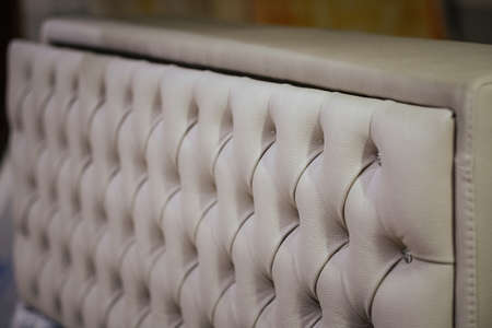 A closeup shot of a textured white couch designの写真素材