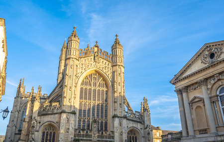 A low angle shot of the Bath Abbey in the UK captured on a sunny dayの写真素材