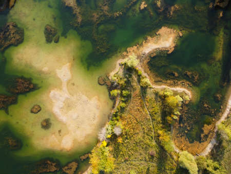 An aerial shot of a lake and landscape