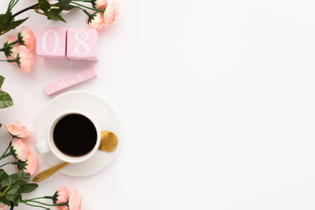 An overhead shot of a Women's day decoration setting on a white surfaceの写真素材
