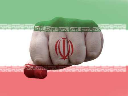A creative photo of a hand with the national flag of Iranの写真素材