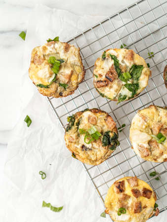 The mini pies made of eggs and green onions for breakfast