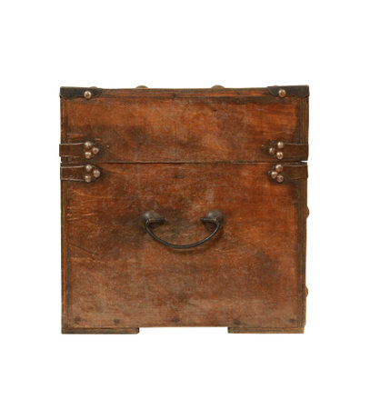 A selective focus shot of a wooden chest on a white background
