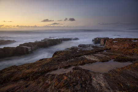 A beautiful sunset over the rocky sea
