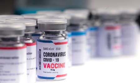 vaccine bottles in a science research laboratory for protectionの写真素材