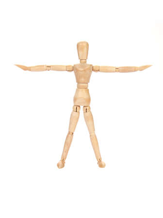 A closeup shot of a wooden figure isolated on a white backgroundの写真素材