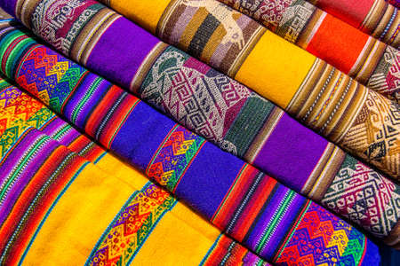 The rolls of colorful fabrics with abstract patterns in Peru