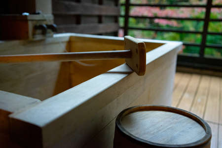 A Japanese hot springs "onsen" natural bath in a resort in Hakone, Japanの写真素材