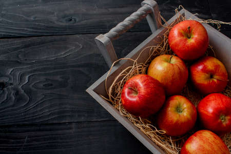 A closeup shot of a bunch of tasty looking red applesの写真素材