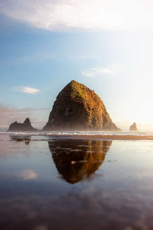 A mesmerizing shot of Haystack Rock at Cannon Beach in Oregonの写真素材