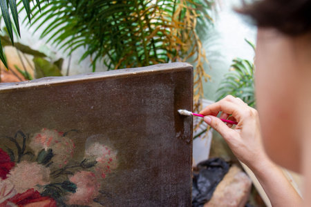 MATANZAS, CUBA - Sep 09, 2020: Restoration of ancient works of art very delicatelyの写真素材