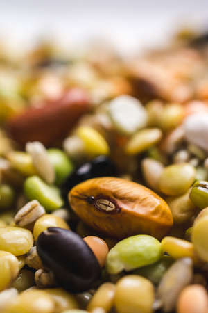 A vertical selective focus shot of mixed beansの写真素材