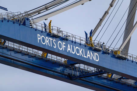 AUCKLAND, NEW ZEALAND - Oct 21, 2019: View of Ports of Auckland sign on container craneの写真素材