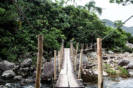 A beautiful shot of Ponta Negra over a river in the forest in Paraty, Brazil