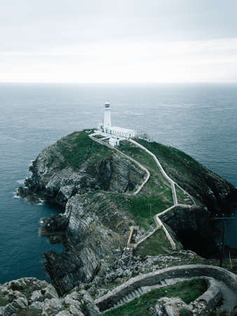 A shot of the lighthouse on the cliff in RSPB South Stack Cliff, Anglesey, Wales