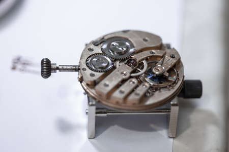 A closeup shot of the gears inside a watch