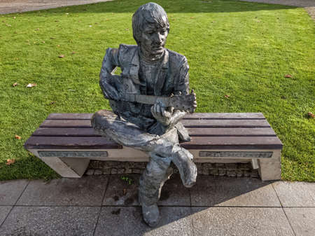 PULTUSK, POLAND - Oct 26, 2019: Pultusk, Poland - October 26, 2019.  Sculpture of Krzysztof Klenczon, born in Pultusk, Polish composer, singer and guitarist.のeditorial素材