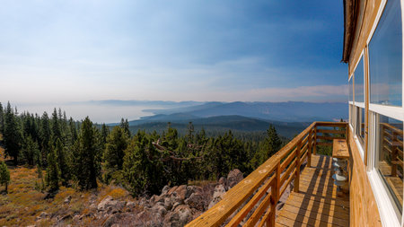 TRUCKEE, CALIFORNIA, UNITED STATES - Oct 08, 2020: A view over Lake Tahoe from the Martis Peak Fire Lookout structure.のeditorial素材