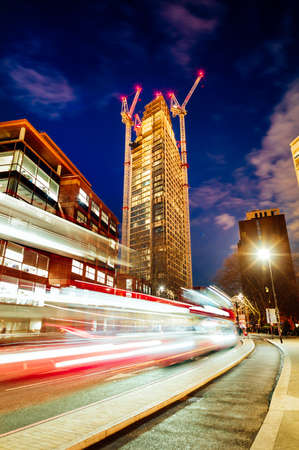 LONDON, UNITED KINGDOM - Oct 10, 2017: A construction site at night in London, United Kingdom.のeditorial素材