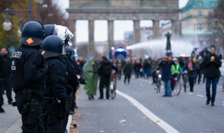 BERLIN, GERMANY - Nov 18, 2020: BERLIN, GERMANY 18.11.2020. Demo in Berlin with the police at the Victory Column against the Corona Covid-19 regulations and for human rights.のeditorial素材