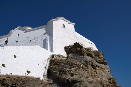 The most famous church on the island,Panagitsa of Pyrgos, is situated on the edge of the port of Skopelos, sitting on top of a rock. It is a beautifulのeditorial素材