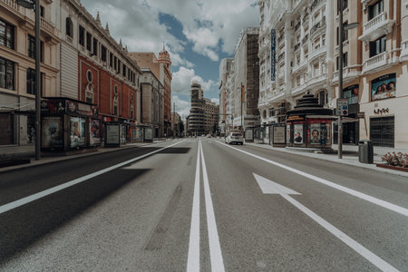 MADRID, SPAIN - Apr 15, 2020: Empty and isolated european street during Covid 19. No people.のeditorial素材