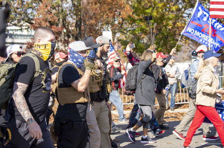 WASHINGTON DC, UNITED STATES - Nov 15, 2020: Proud Boys marching at the MILLION MAGA MARCH holding...