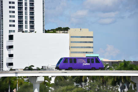 MIAMI, UNITED STATES - Sep 09, 2019: Miami metromover, passing over the city, with buildings in the background and a clear sky, Miami United Statesのeditorial素材