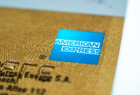 MUNICH, GERMANY - Apr 29, 2020: Closeup of an Amex credit card. American Express gold card. The bank...