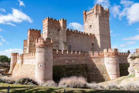 The Castle of La Mota under the sunlight and a blue sky at daytime in Medina del Campo, Spainのeditorial素材